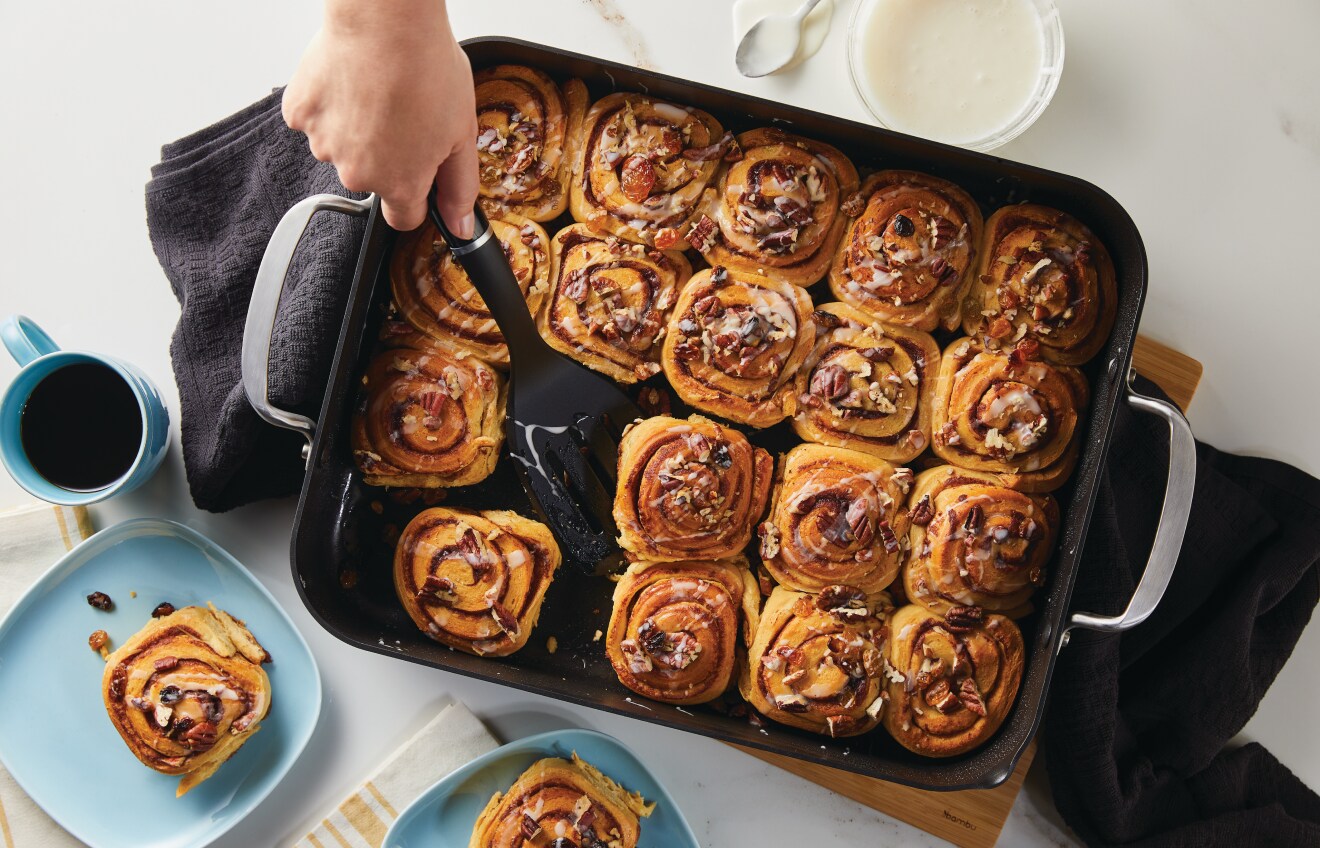 Preparing cinnamon rolls in a KitchenAid® Roasting Pan