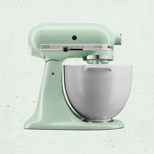 Pistachio colour Stand Mixer in front of light green background