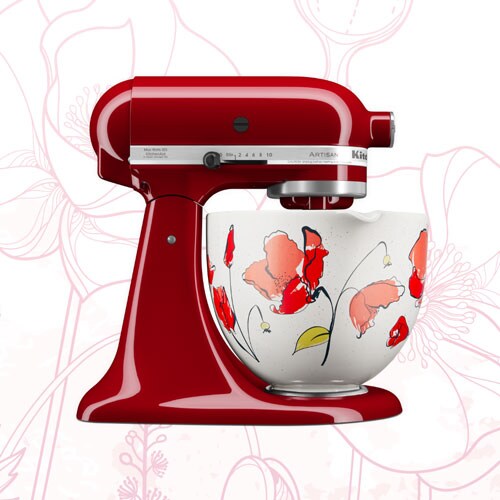 Red Stand Mixer in front of light textured background