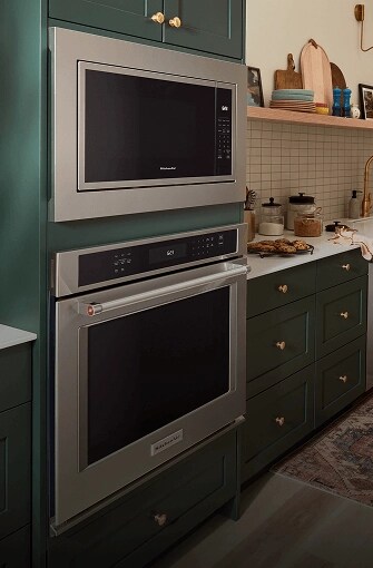 A KitchenAid® Built-In Microwave installed above a KitchenAid® Wall Oven.