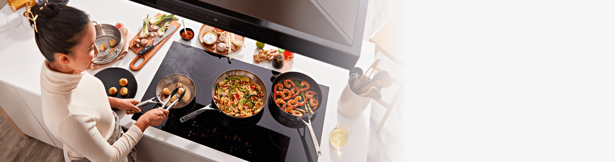 A KitchenAid® Food Chopper being used to make pico de gallo.