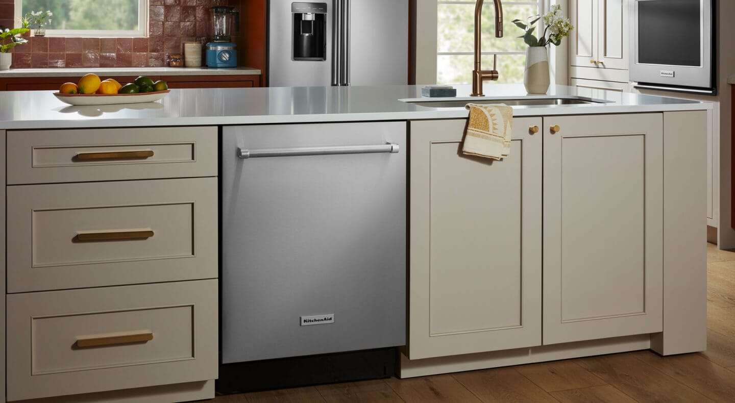 Flush KitchenAid® dishwasher installed in a kitchen island