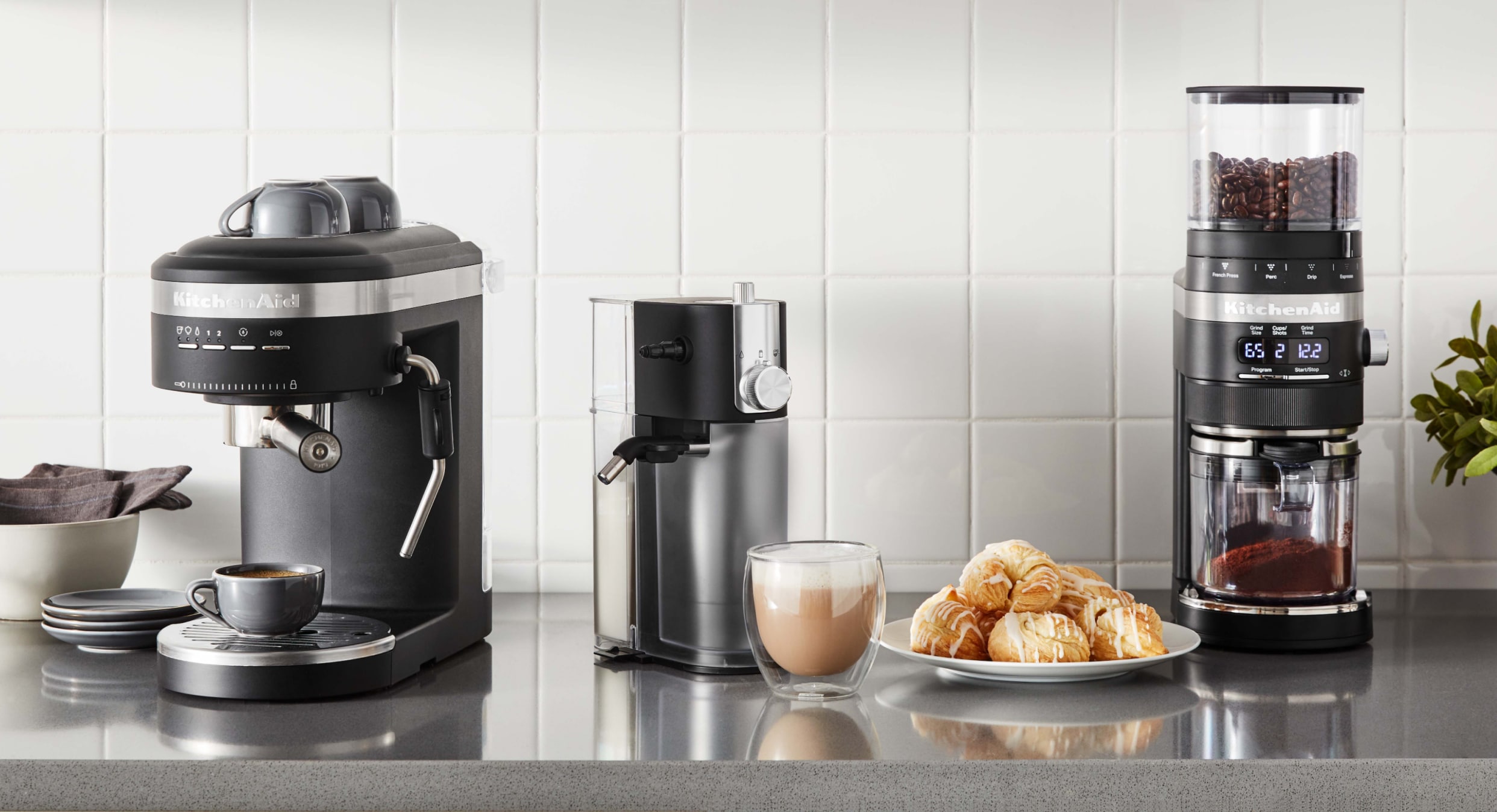 Kitchen with white backsplash and KitchenAid® Coffee Collection 