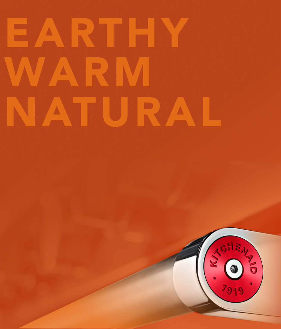 Range handle with red medallion.