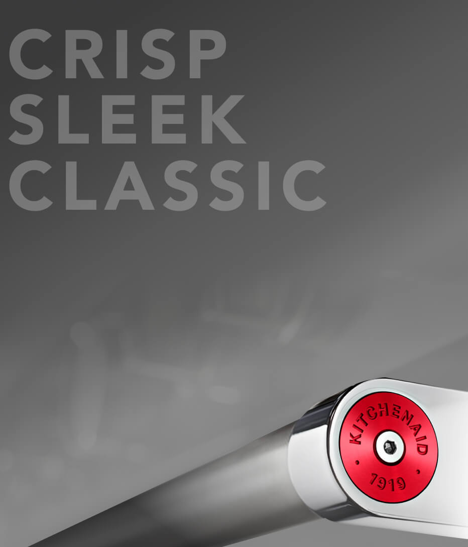 Range handle with red medallion.