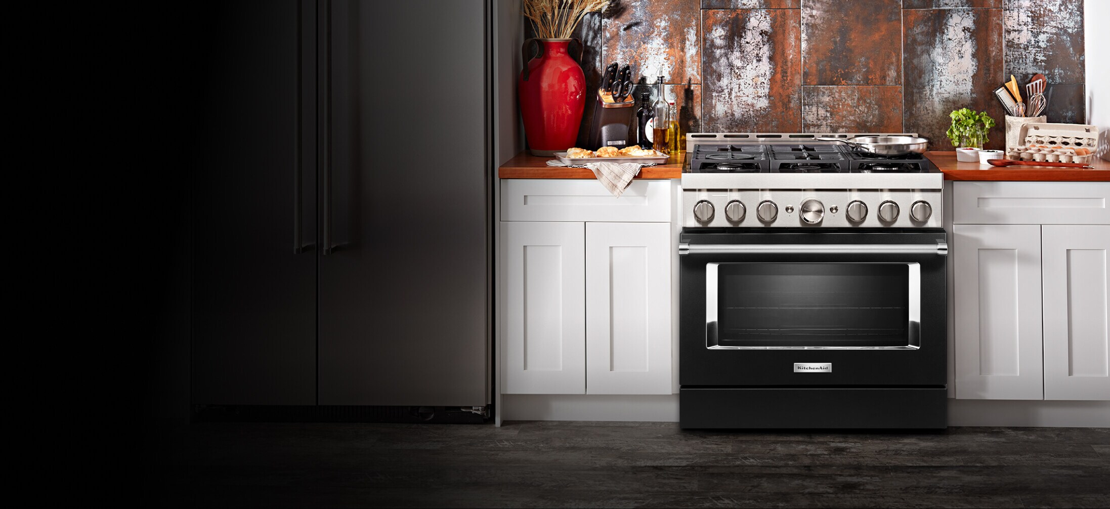 Kitchen with imperial black range.