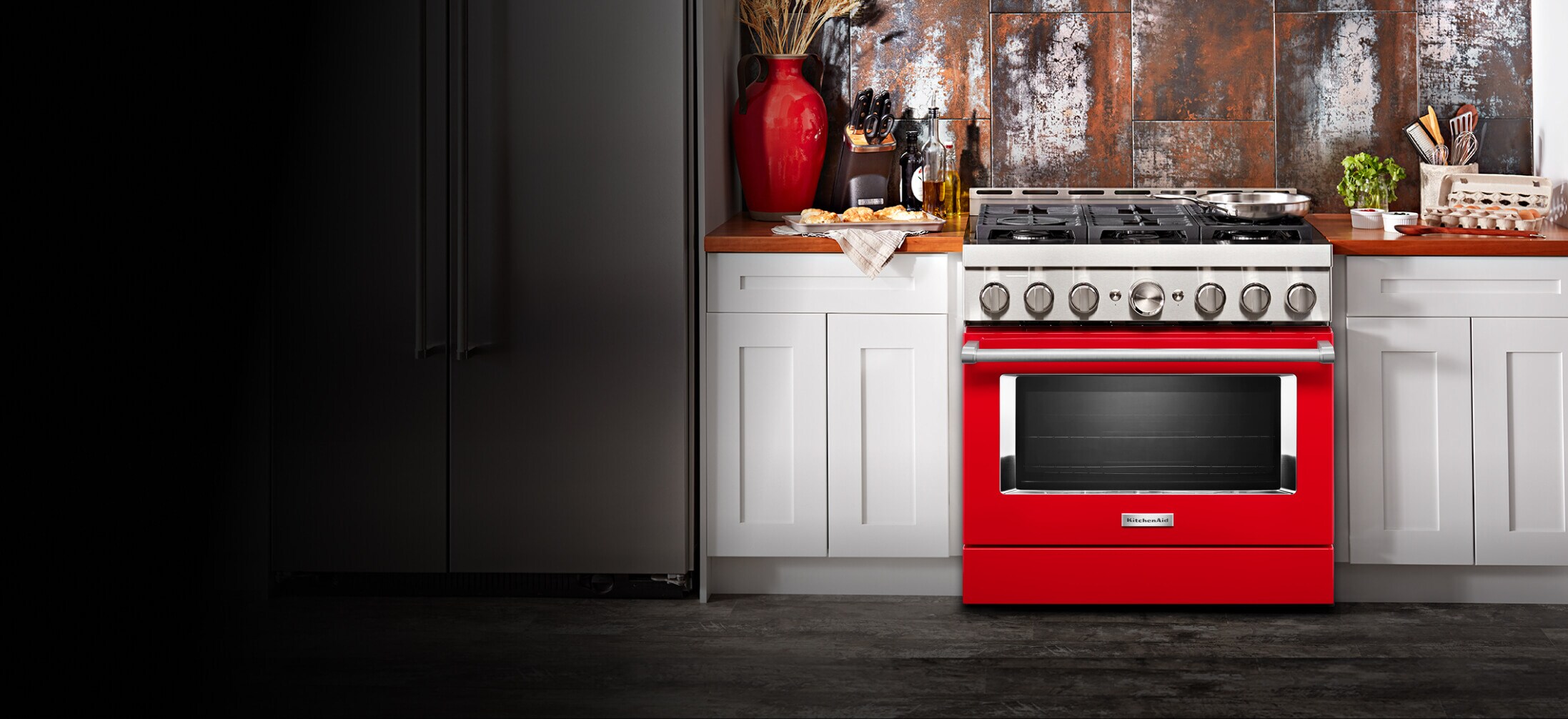 Kitchen with passion red range.