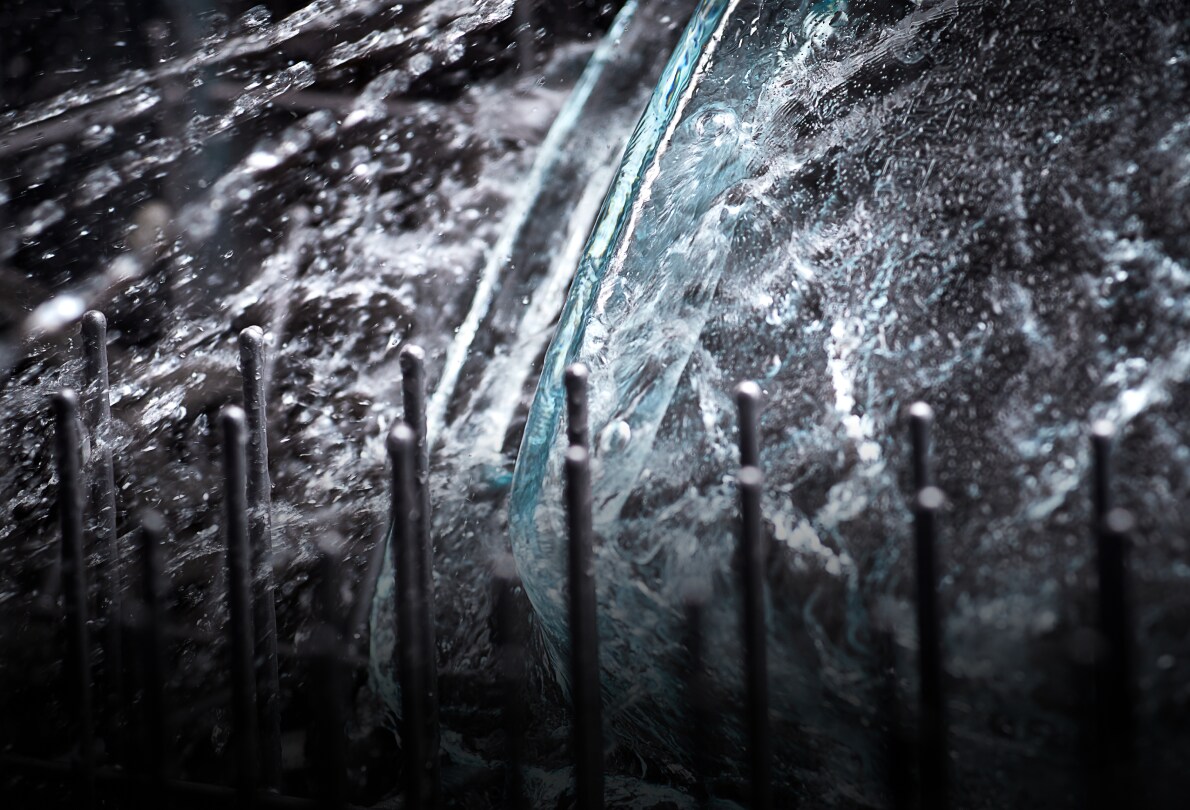 Water spraying out of dishwasher spray arm