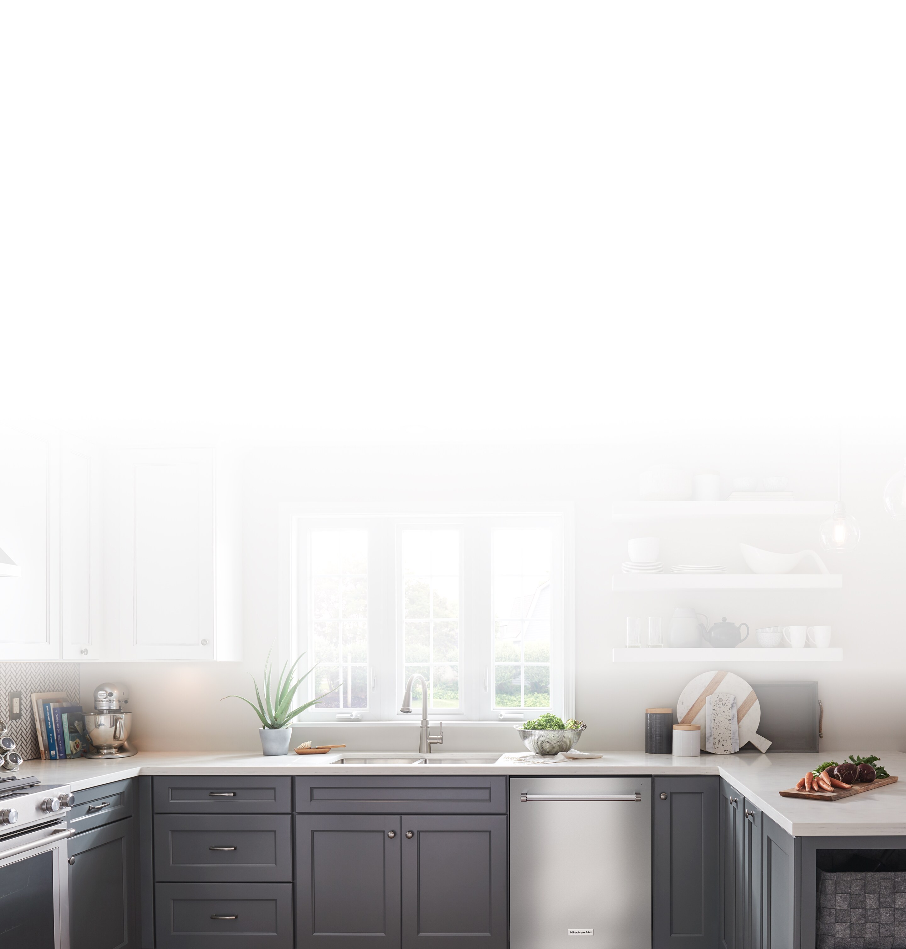A KitchenAid® dishwasher in a bright kitchen. 