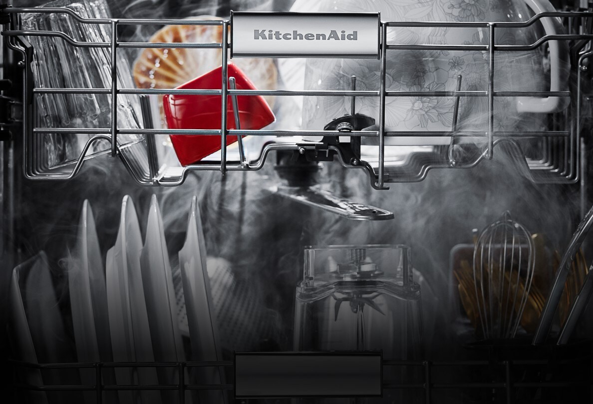 A close up of the loaded dishwasher.