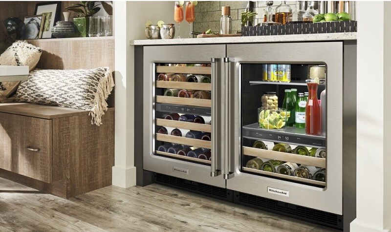 A stocked KitchenAid® Wine Cellar and Beverage Center.