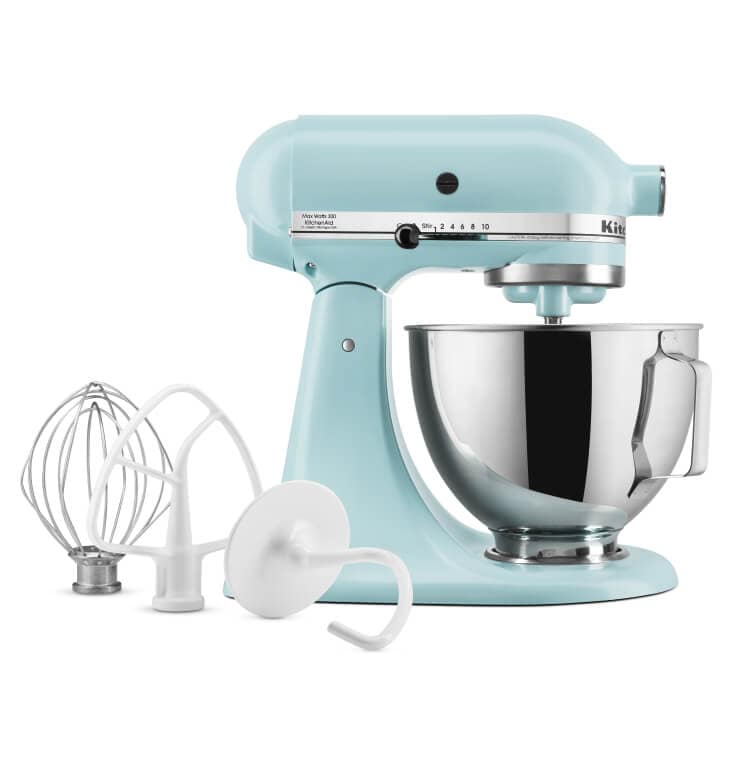 A KitchenAid® tilt-head stand mixer with accessories