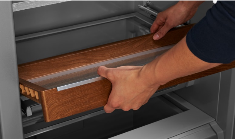 Removing Sliding Storage Tray