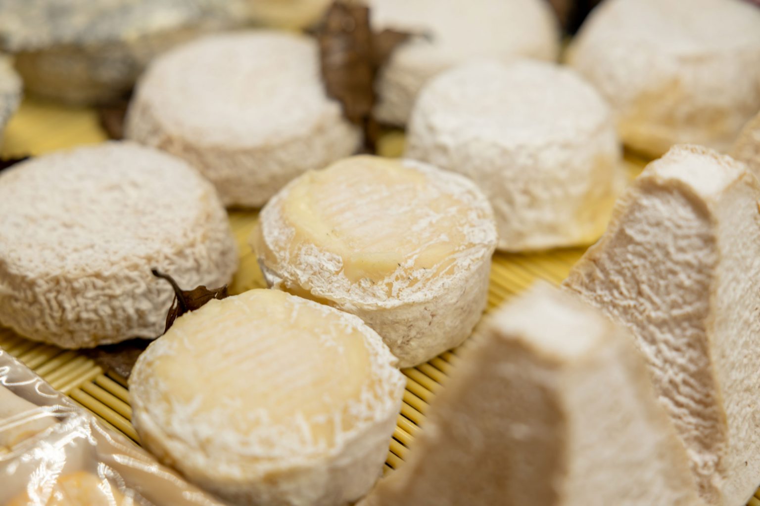 Small wheels of cheese.
