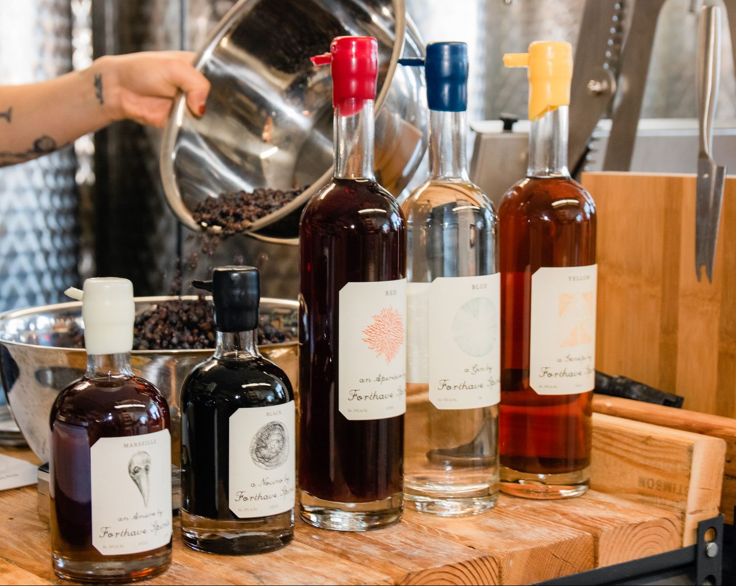 A variety of liquor bottles from Forthave Spirits.