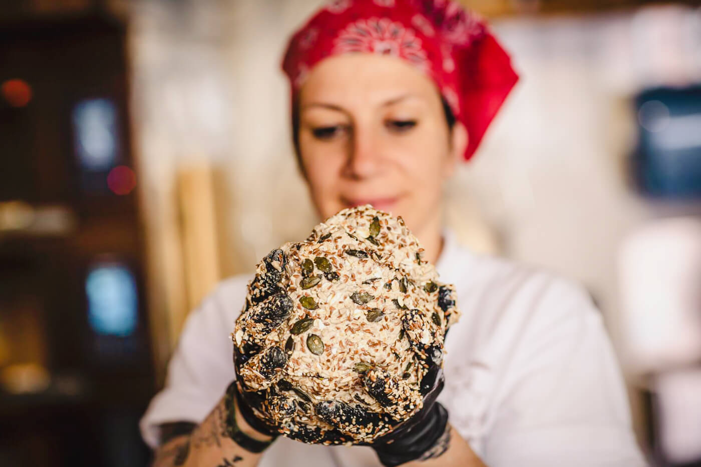 Roberta Pezzella holding a large wad of dough.