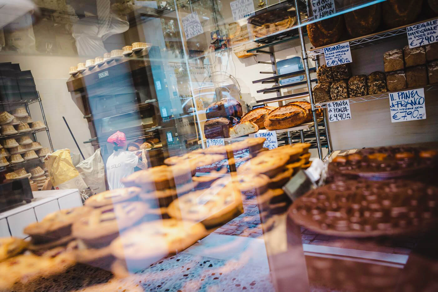 Roberta Pezzella examining her loaves of bread.
