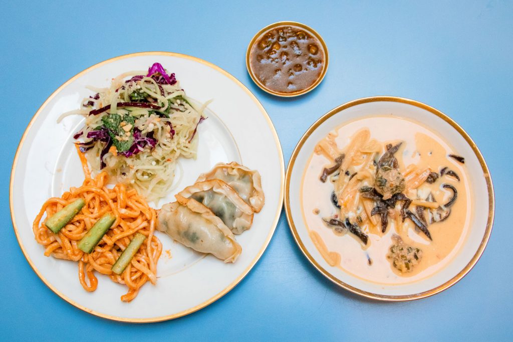 Plates filled with take-and-make orders from Myers + Chang.