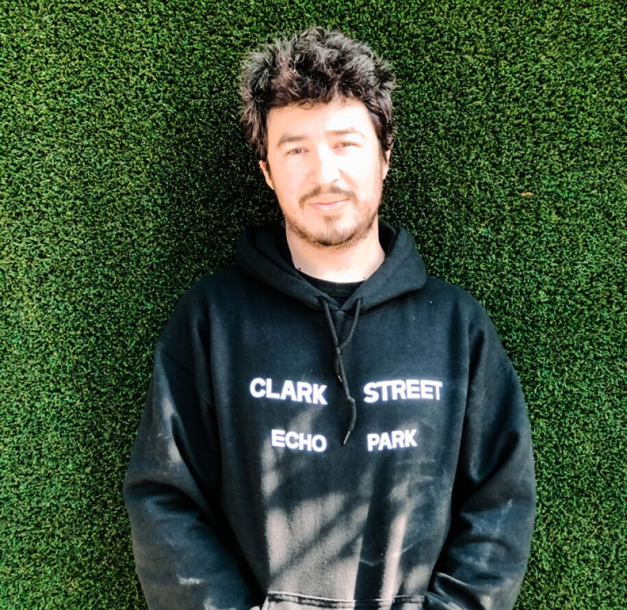 Zach Hall posing for a picture.