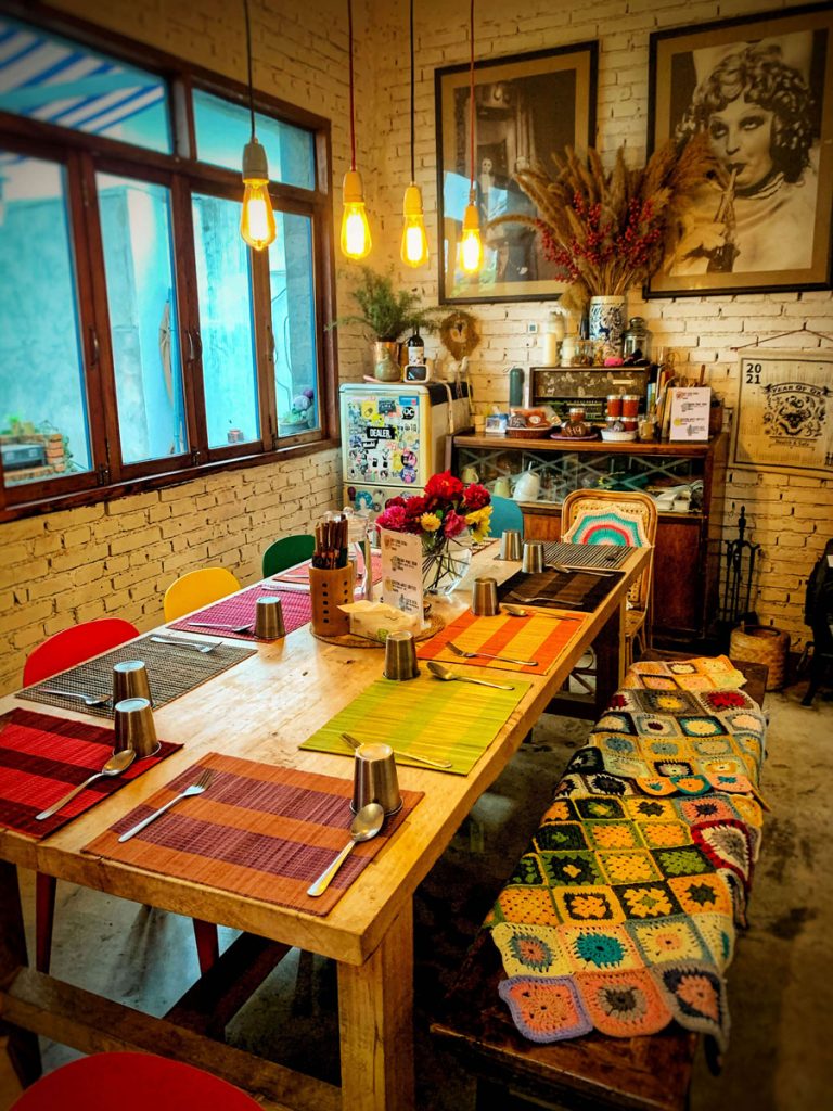A large, colorfully decorated dining table.
