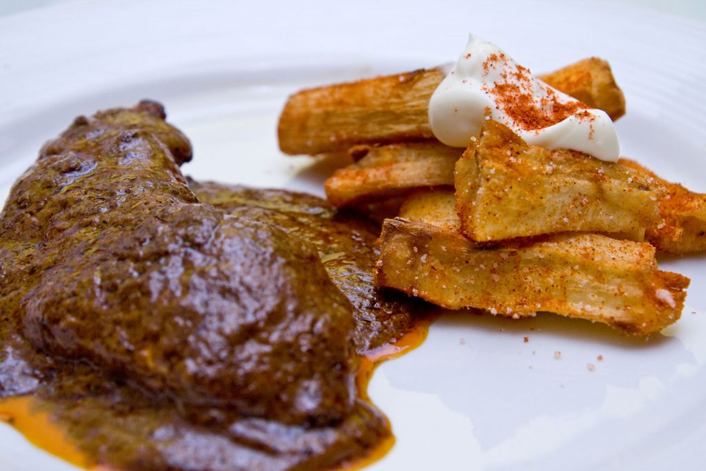 Fried yuca and meat.