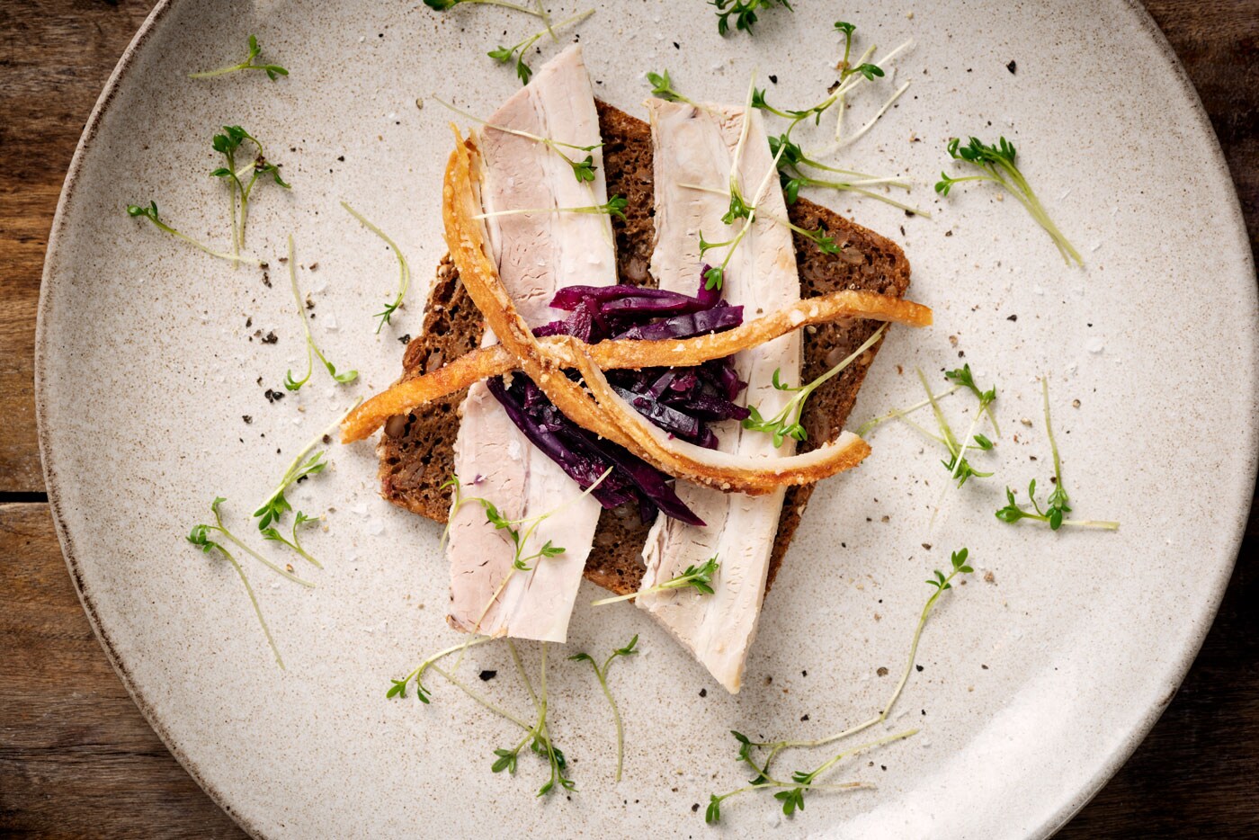 A plated Danish open-faced sandwich.
