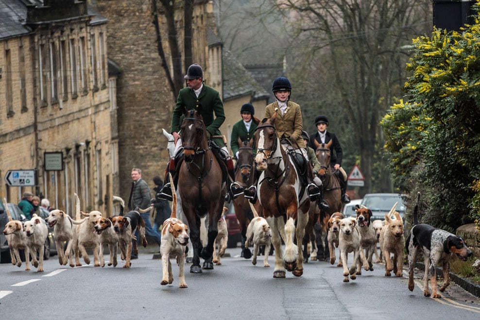 People riding on horseback.