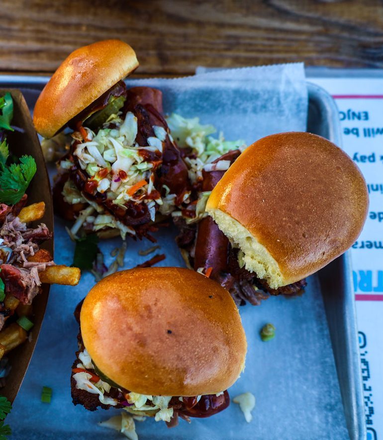 Three loaded sandwiches.