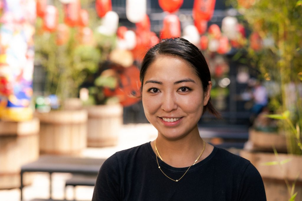 Erina smiling for a photo.