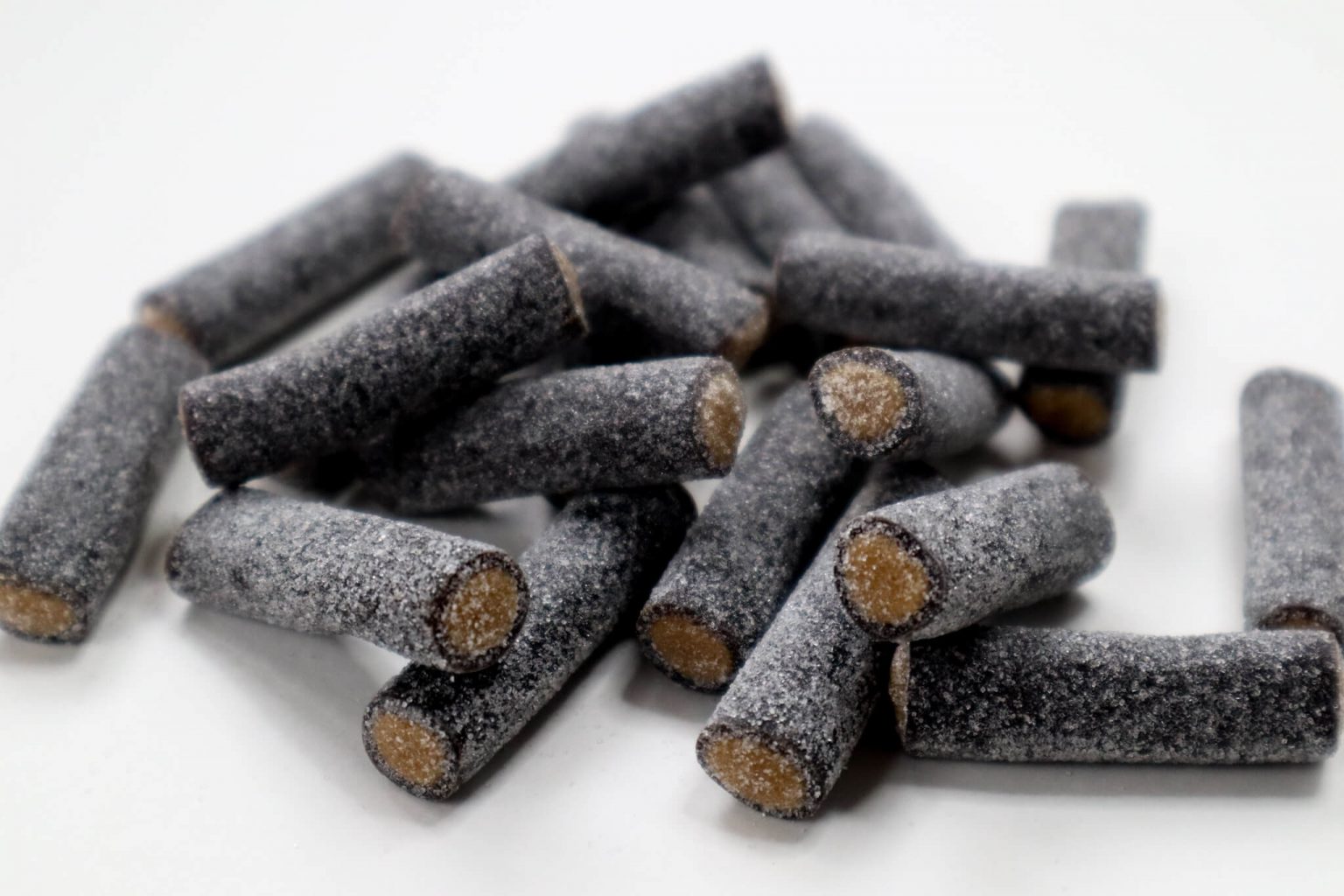 A pile of sugared salmiakki.