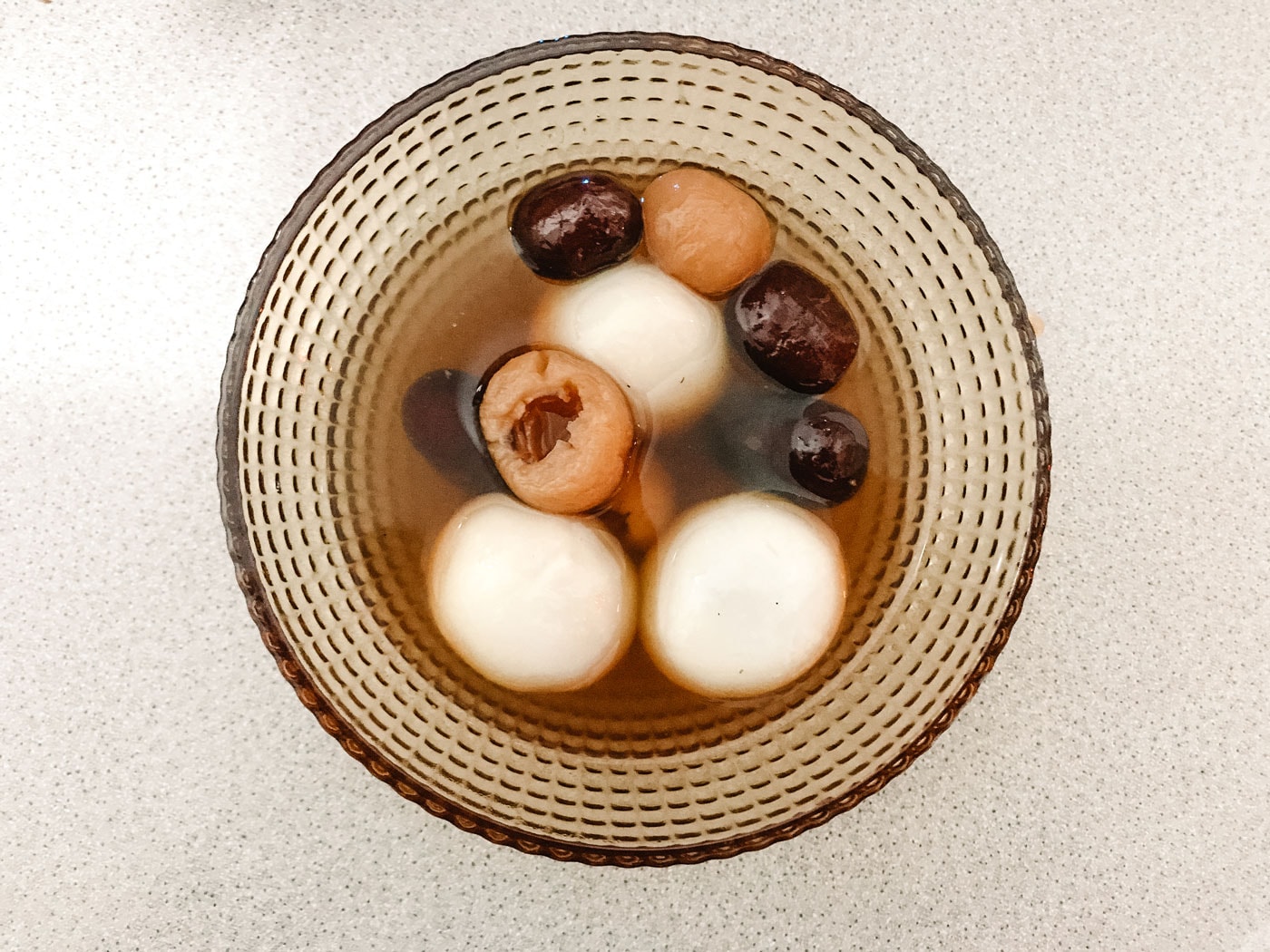 A large, filled pot resting on a stove.