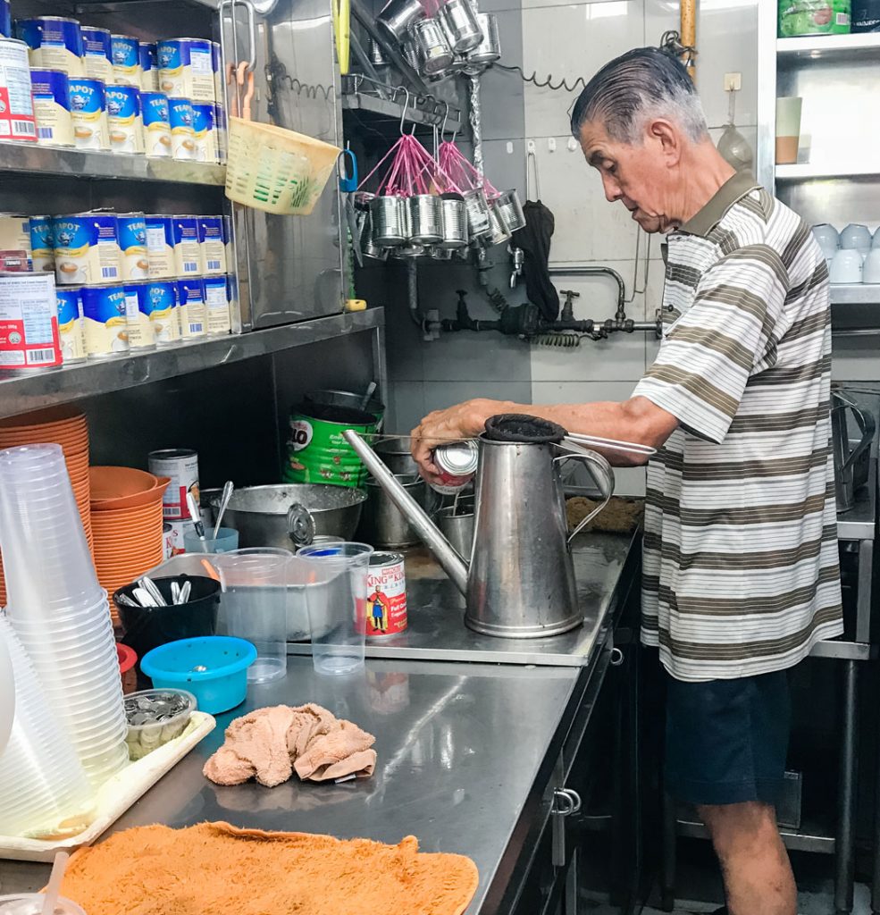 A person prepping in the kitchen.