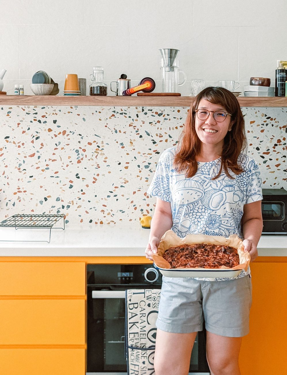 Medhā Lim posing for a photo.