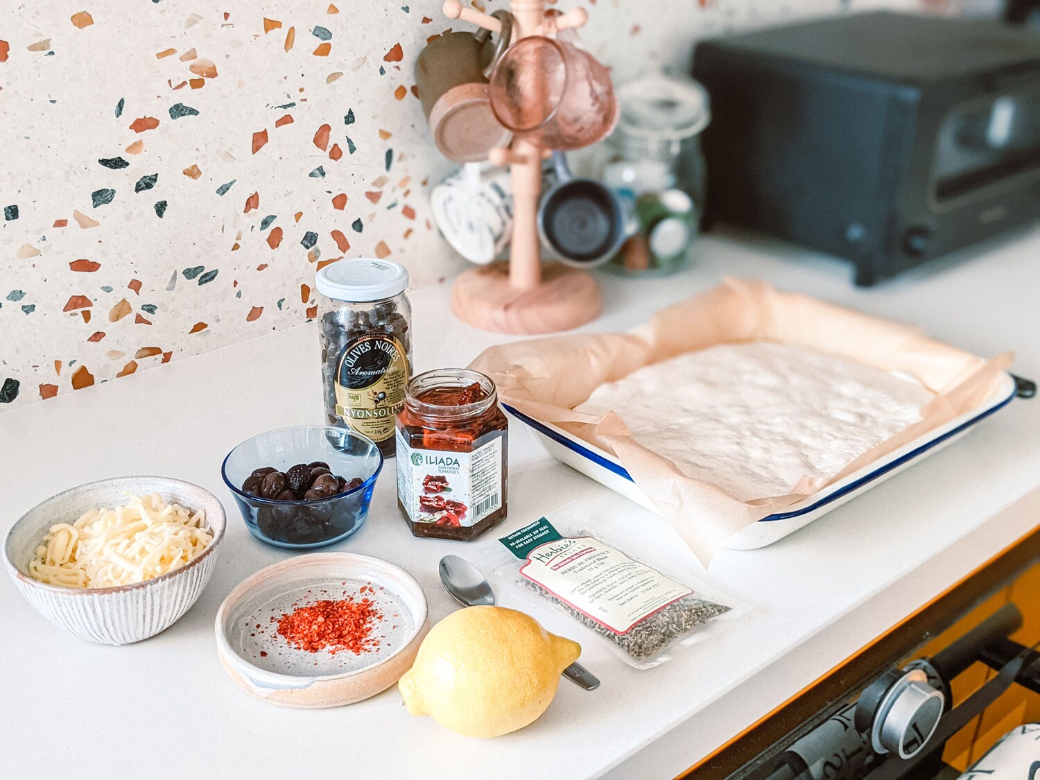Separated ingredients for focaccia bread.