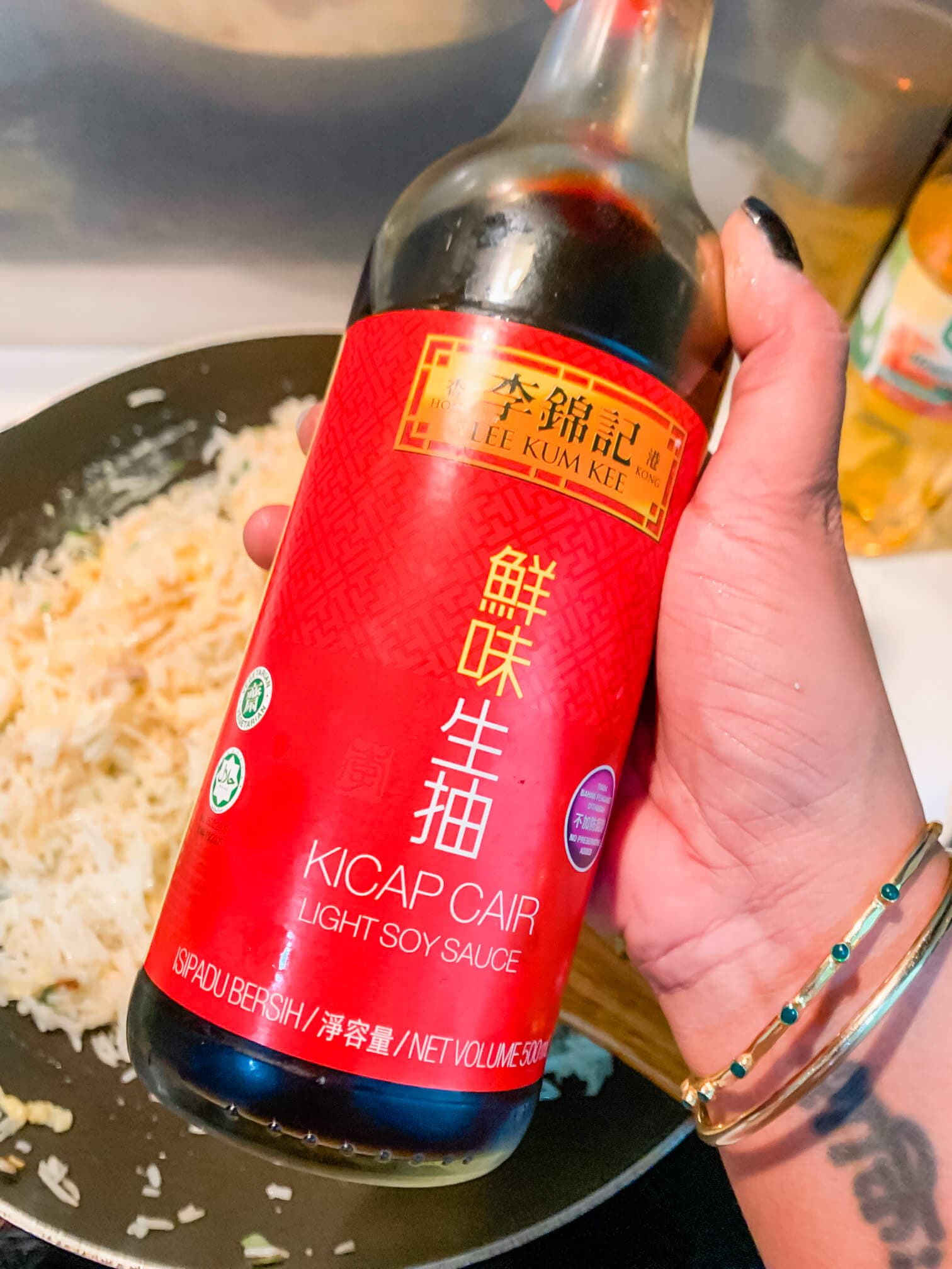 A large bottle of light soy sauce.