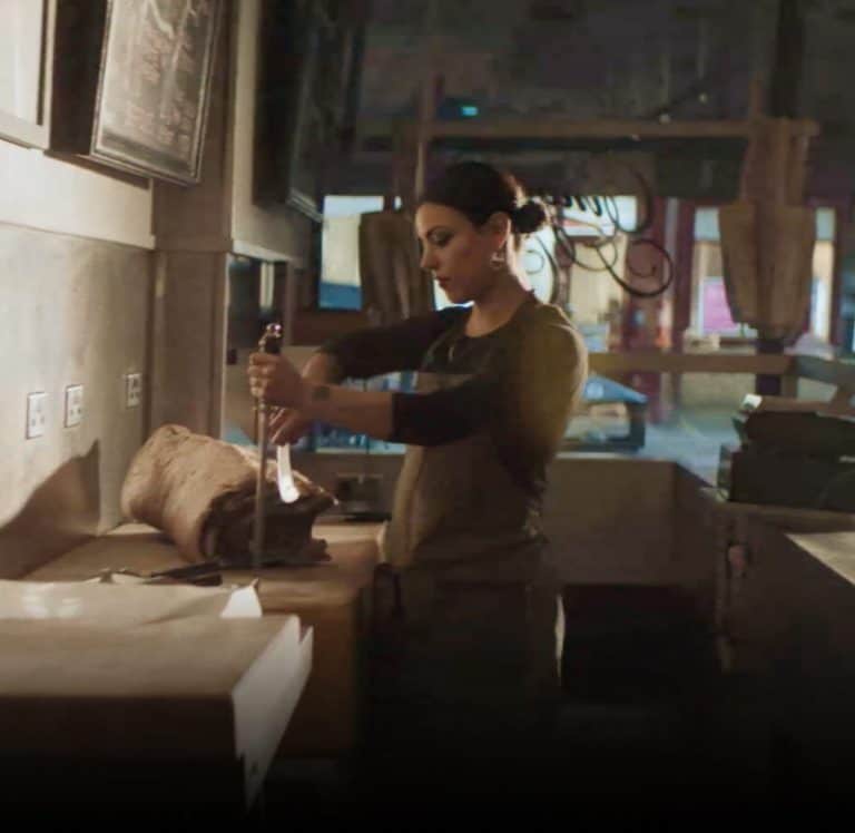 Etana Diaz sharpening her butcher’s knife.