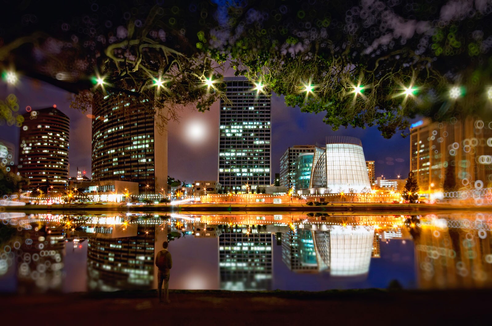 The nighttime cityscape of of Oakland, California.