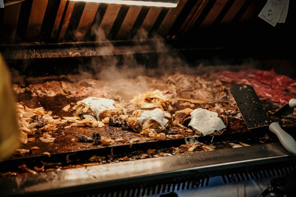 A fully loaded grill covered in food at Donkey's Place.