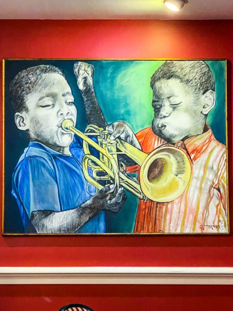 Colorful art on display at Dooky Chase's Restaurant.