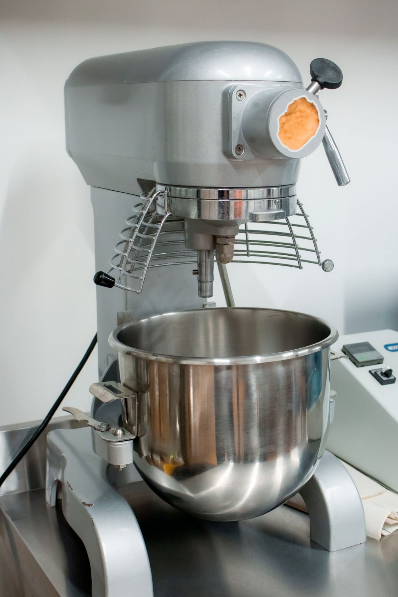 A large, powerful mixer used to blend the ingredients of the plant-based nuggets.