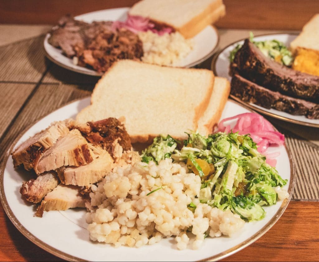 Plates filed with different Simcha eats.
