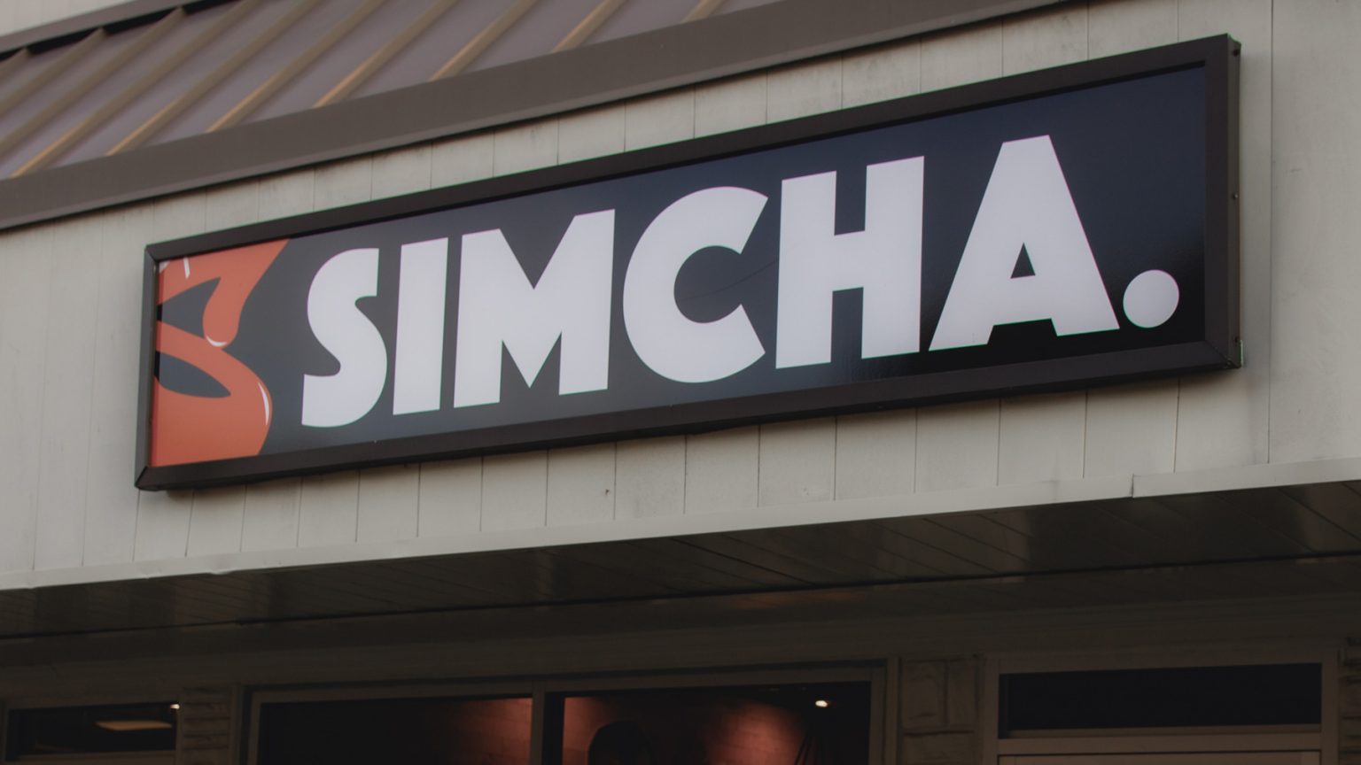 The restaurant sign for Simcha.