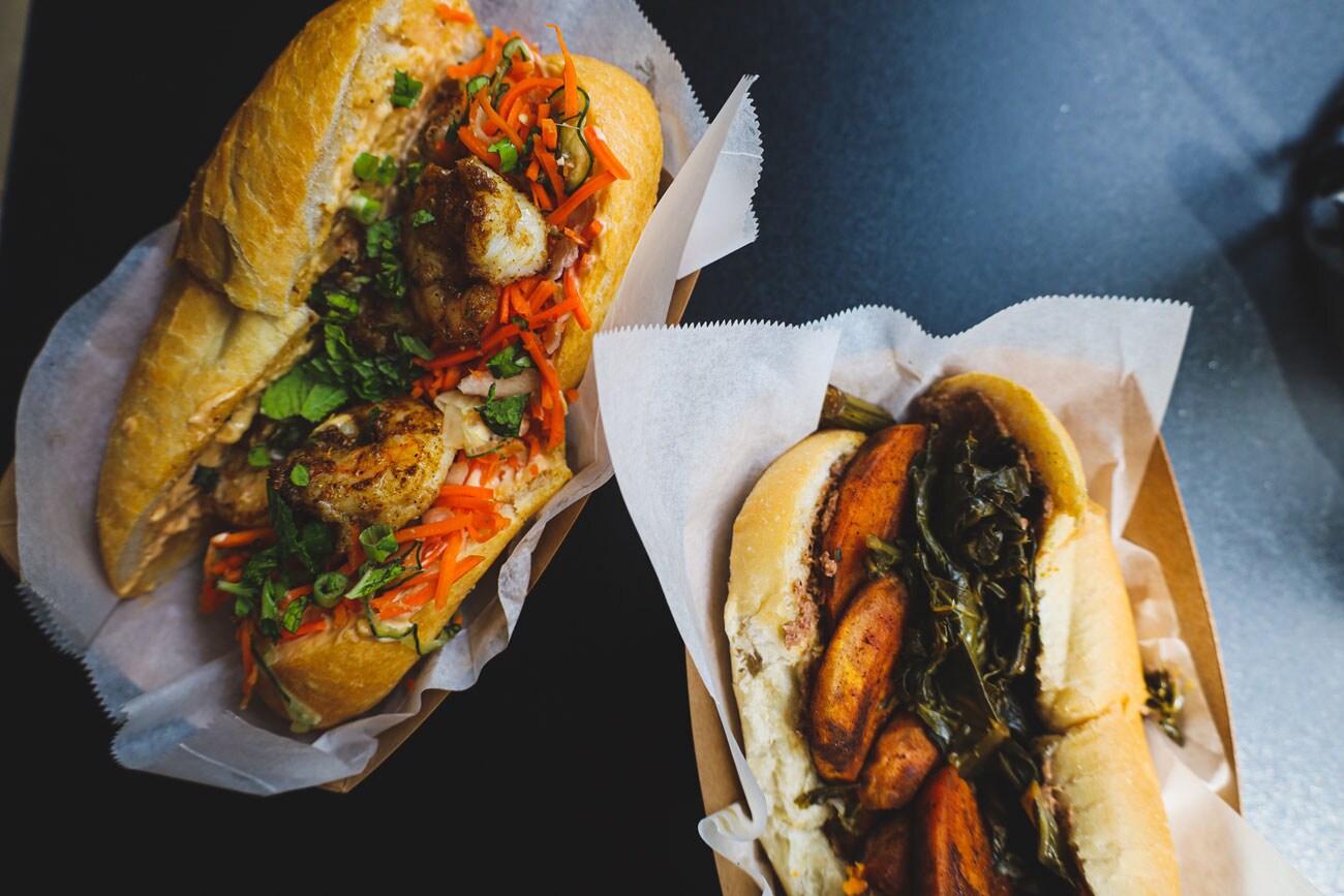 Two po'boy sandwiches.