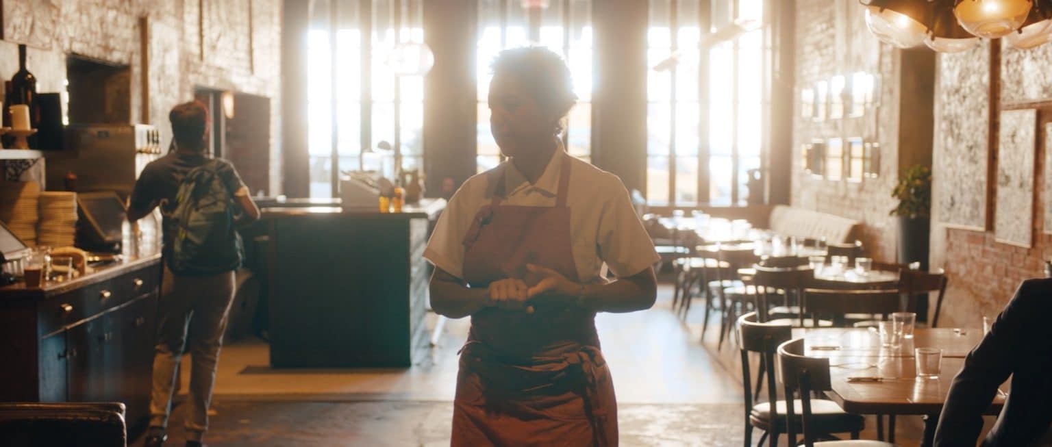 Nina Compton observing her restaurant, Bywater American Bistro.