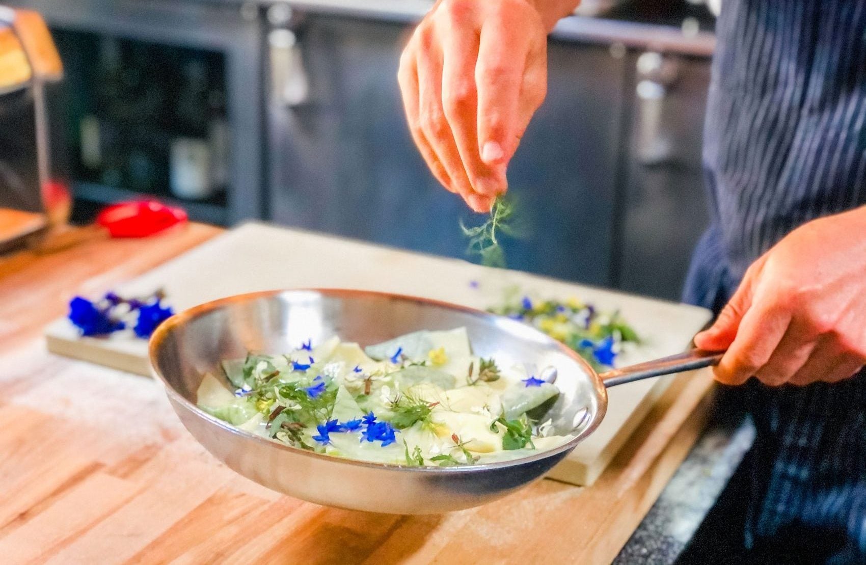 Edible flowers garnishing a dish.
