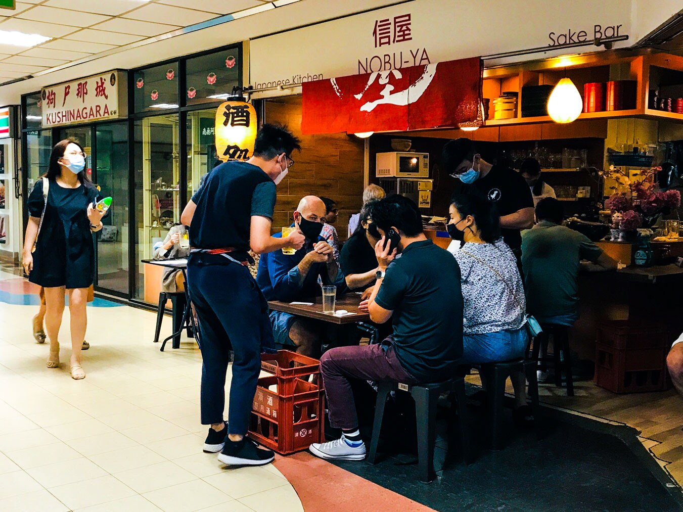 People drinking at Nobu-ya.