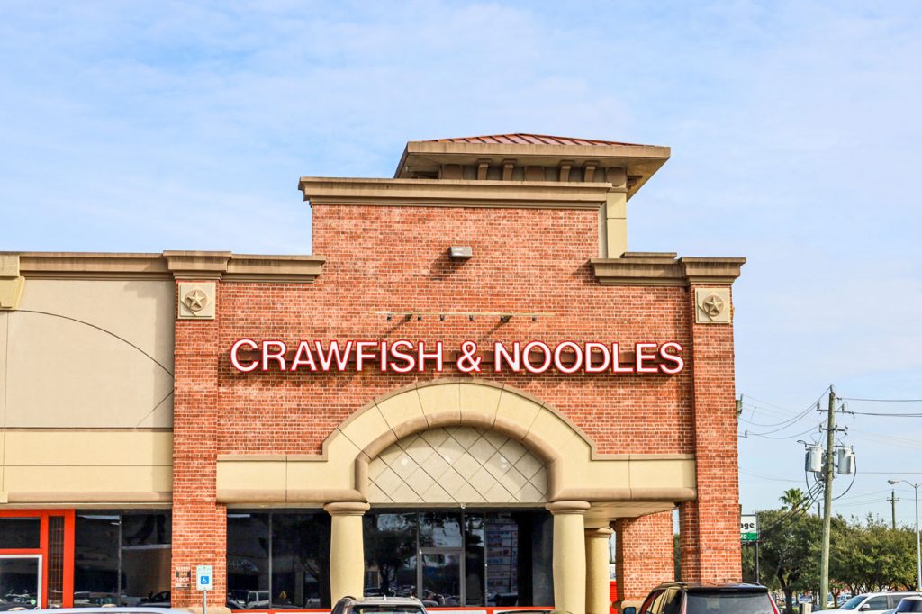 The exterior of Crawfish & Noodles.