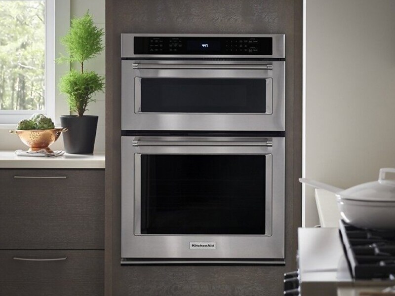 A stainless steel KitchenAid® combination wall oven. A stainless steel KitchenAid® combination wall oven.