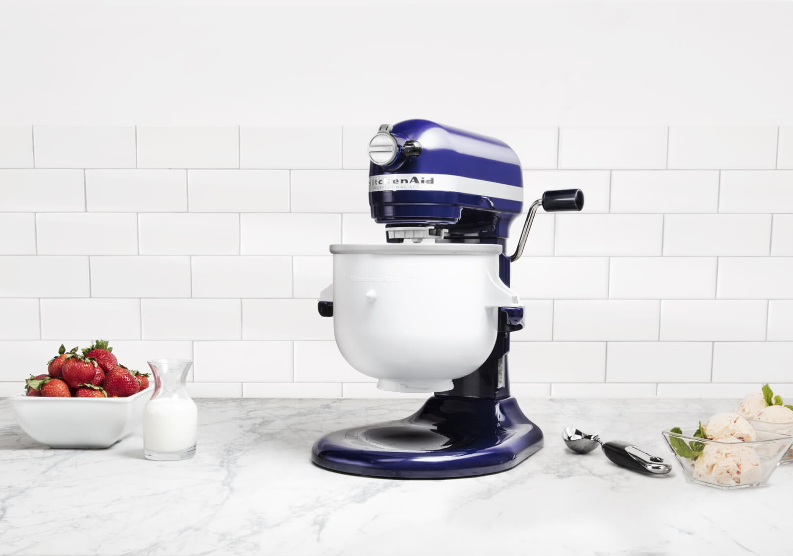 alt A KitchenAid® bowl-lift stand mixer with strawberries and milk.