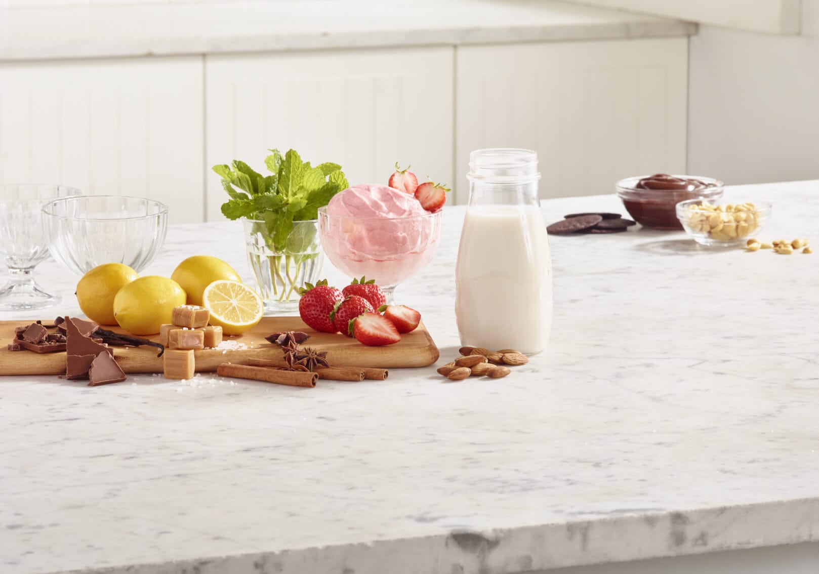 alt Ingredients and toppings for making frozen yogurt at home.